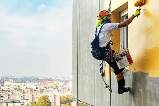 Rope access on a tall facade near Rosecrans